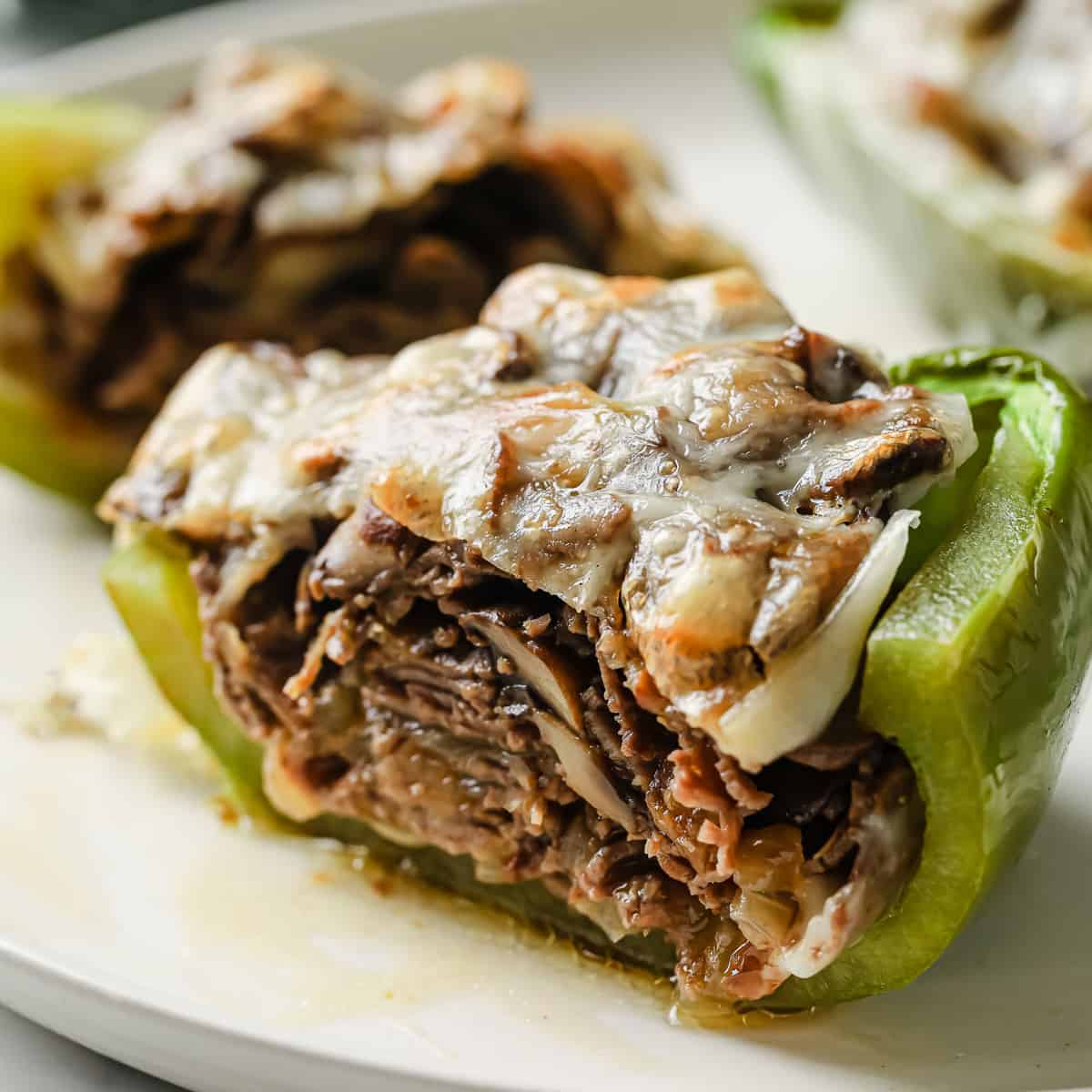Keto Philly cheesesteak stuffed peppers keep the classic flavor, minus bread